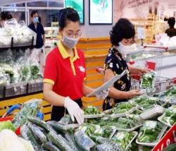 Nhà sản xuất và bán lẻ hàng tiêu dùng vừa chống dịch vừa thúc đẩy sản xuất kinh doanh - Ảnh 1. Nhà sản xuất và bán lẻ hàng tiêu dùng vừa chống dịch vừa thúc đẩy sản xuất kinh doanh - Ảnh 1.