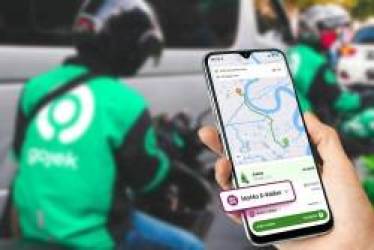 Bỏ phát triển ví riêng như Grab, Gojek bắt tay với MoMo tích hợp luôn vào ứng dụng - Ảnh 1.