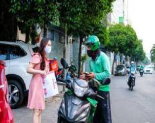 Grab tăng giá cước, tài xế nói gì? - Ảnh 2. Grab tăng giá cước, tài xế nói gì? - Ảnh 2.